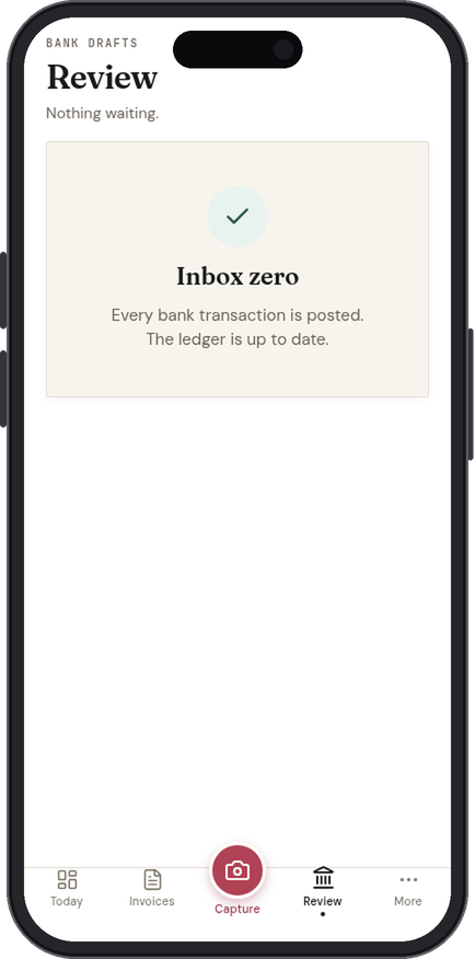 The Review tab in the IQ Books app at inbox zero: every bank transaction posted
