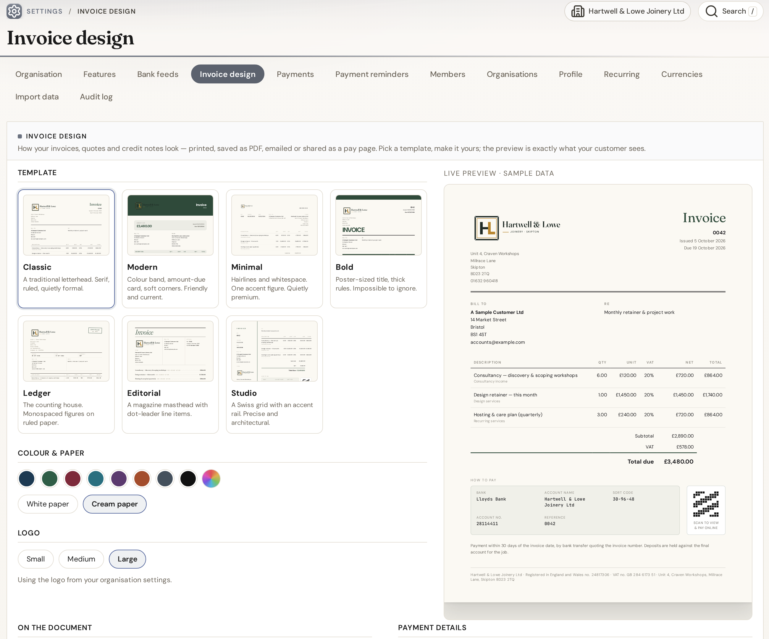 IQ Books invoice design settings with seven templates, colour and paper choices and a live preview of a VAT invoice for a joinery company